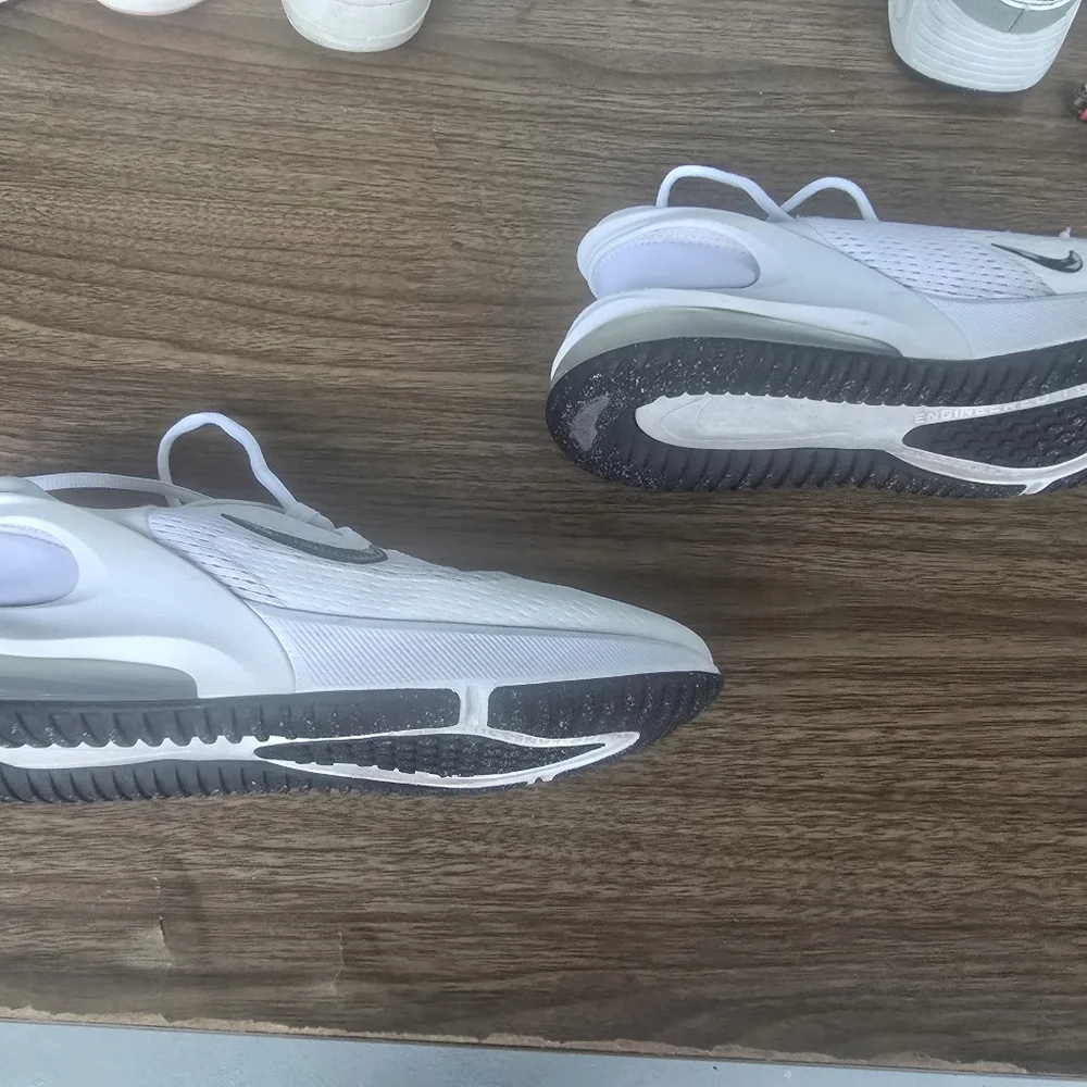White Nike Sneakers with Black Swoosh